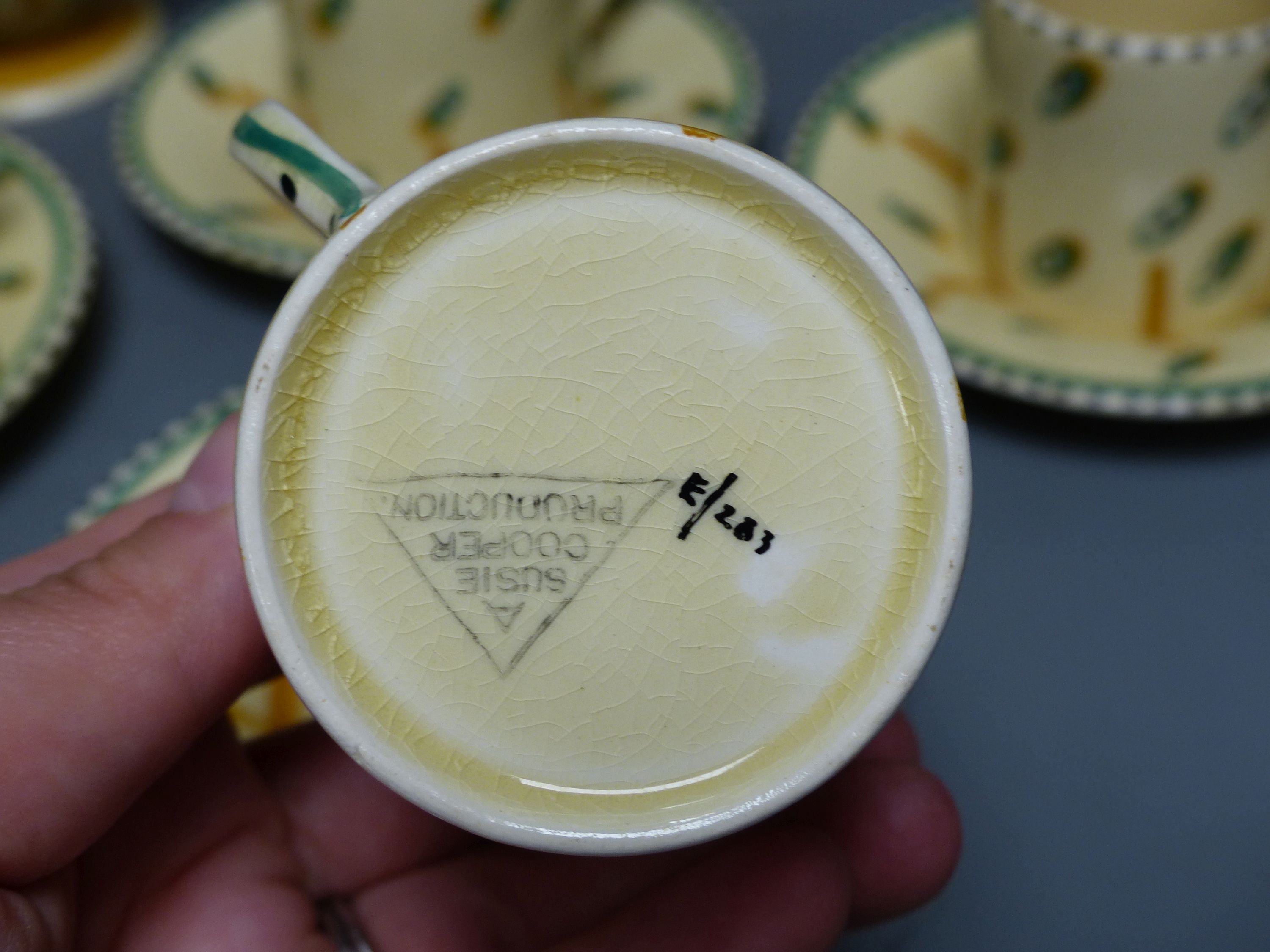 A rare 1930s Susie Cooper coffee set, pattern E283, triangular Susie Cooper Productions mark